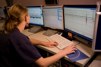 Image of staff monitoring patients in sleep lab